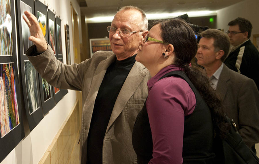 Isstvan Virag in the gallery with visitors